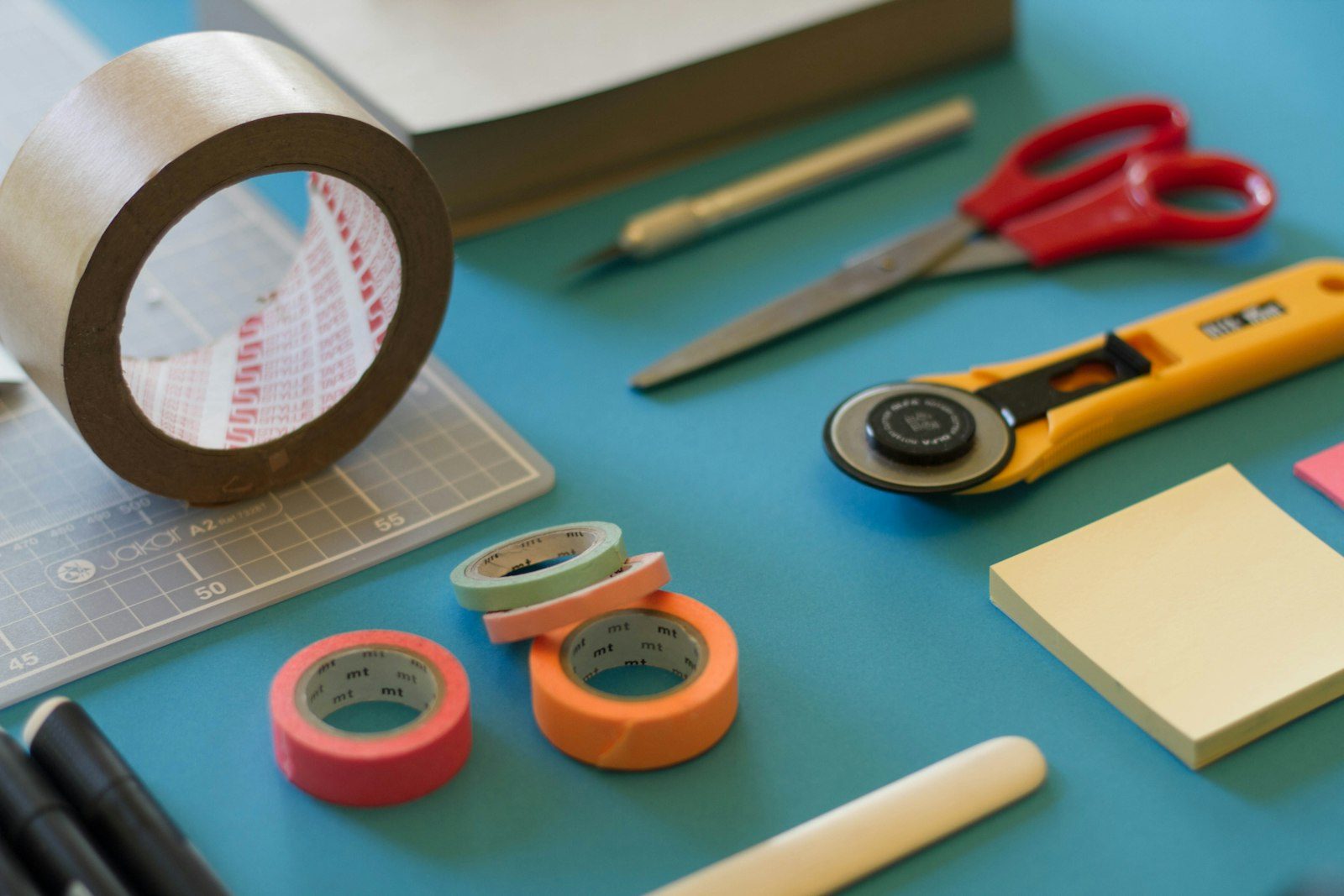 Craft supplies and tools arranged on a work table